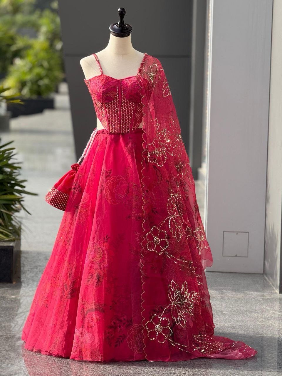 Pink organza lehenga with batwa bag - Image 1