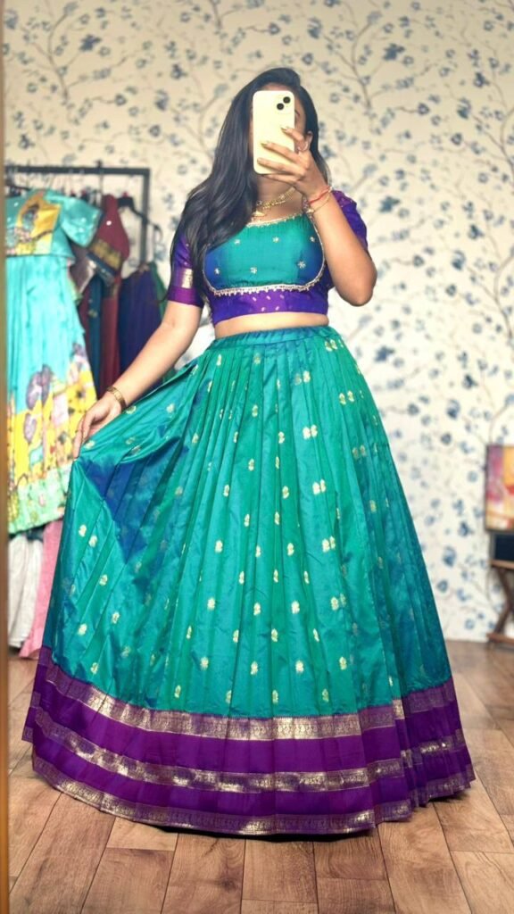 Emerald-green dual shade with purple border lehenga