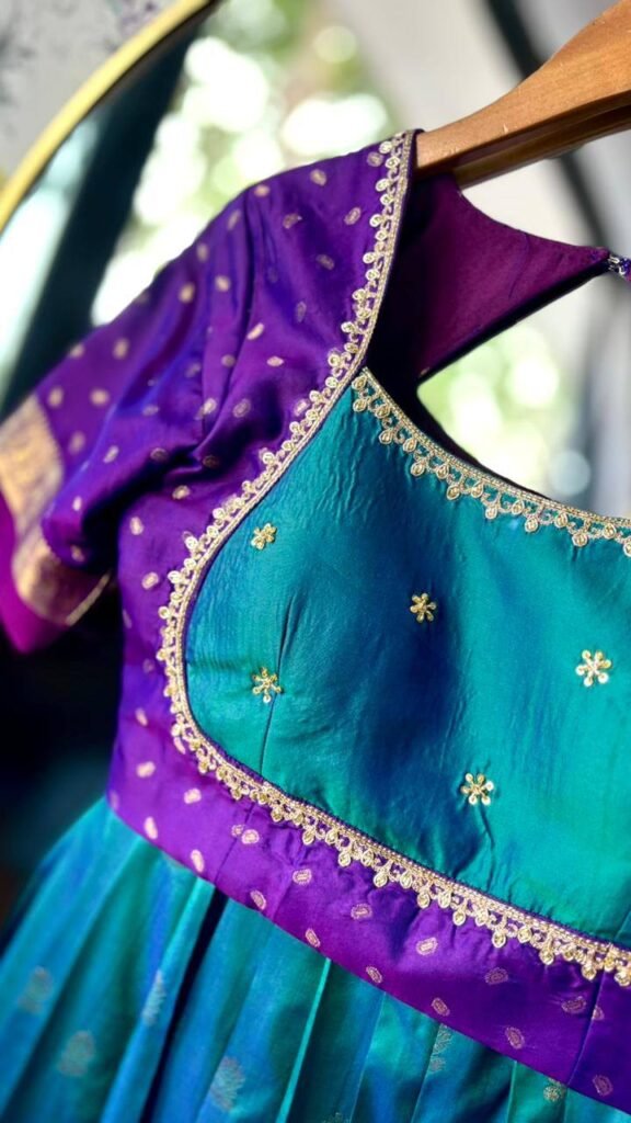 Emerald-green dual shade with purple border lehenga
