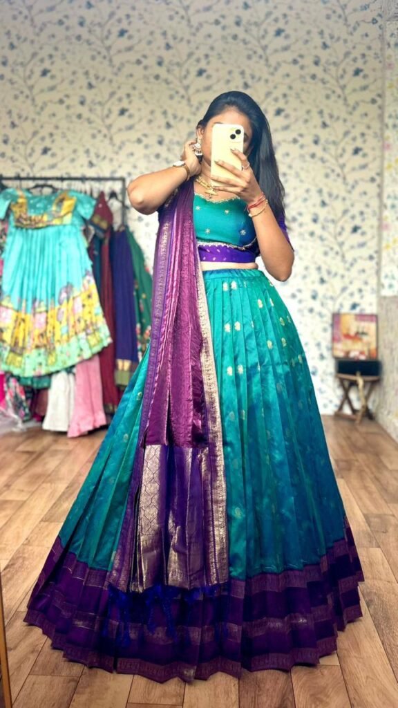 Emerald-green dual shade with purple border lehenga