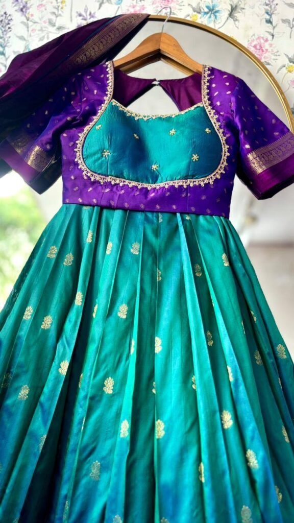 Emerald-green dual shade with purple border lehenga