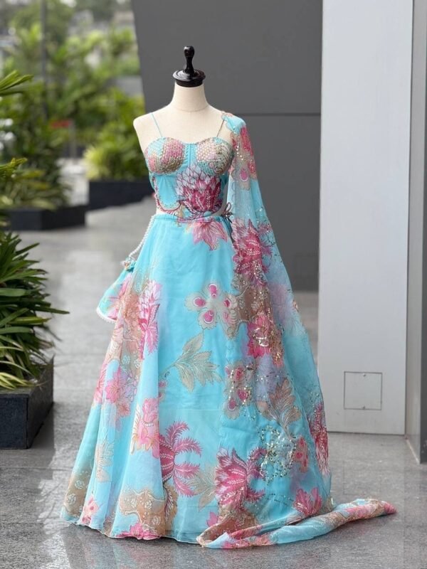 Sky blue organza lehenga set with batwa bag