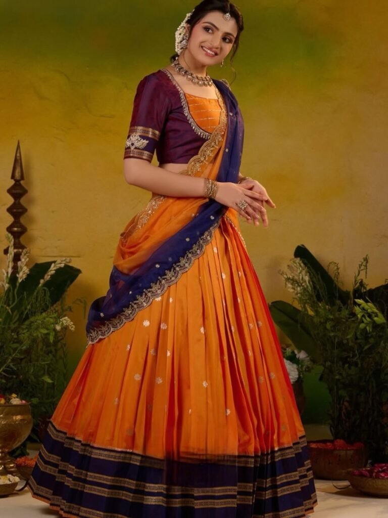Adheera Soft Silk Orange Lehenga Set