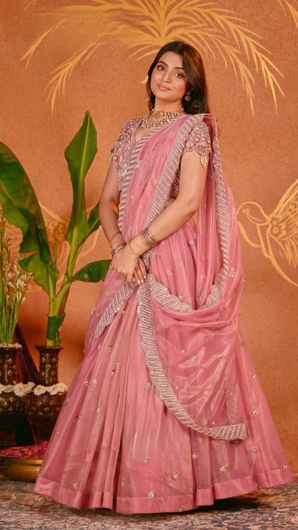 Dhanshi Bridal Pink Lehenga Set in shimmar Net - Image 1